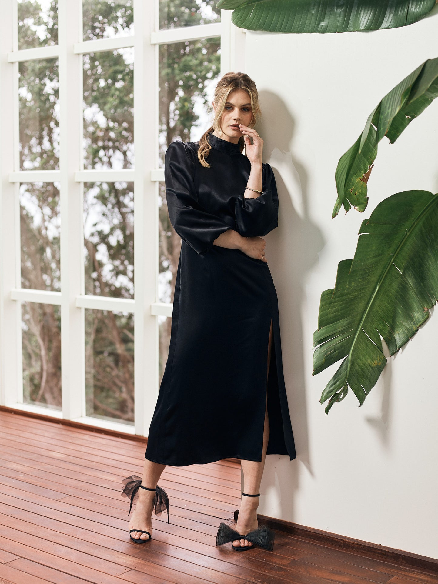 Model Jordan Simek wearing Hera silk dress in Black